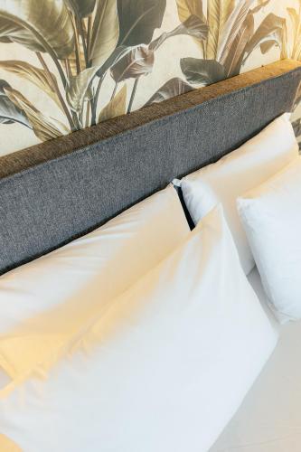 Postel nebo postele na pokoji v ubytování Aparthotel Aurum