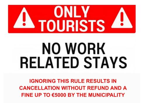 a sign that reads only tourists no work related stays at Kramsvogel I Woning met Fijne Tuin in Zwiggelte