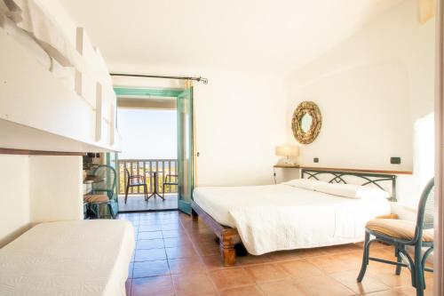 Postel nebo postele na pokoji v ubytování Park Hotel Asinara