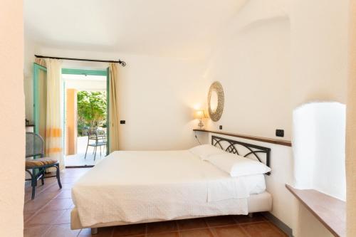 Postel nebo postele na pokoji v ubytování Park Hotel Asinara
