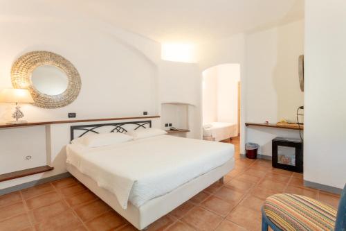 Postel nebo postele na pokoji v ubytování Park Hotel Asinara