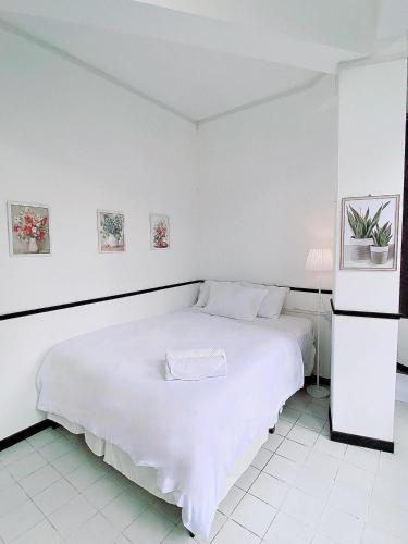 Ένα ή περισσότερα κρεβάτια σε δωμάτιο στο GO INN Hua Lamphong - โกอินน์ หัวลำโพง