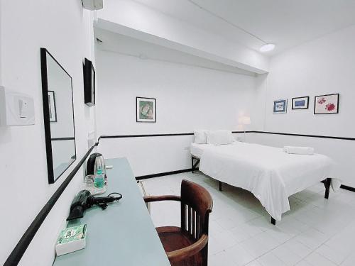 Ένα ή περισσότερα κρεβάτια σε δωμάτιο στο GO INN Hua Lamphong - โกอินน์ หัวลำโพง