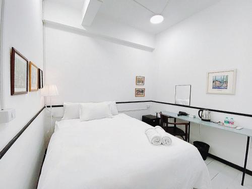 Ένα ή περισσότερα κρεβάτια σε δωμάτιο στο GO INN Hua Lamphong - โกอินน์ หัวลำโพง