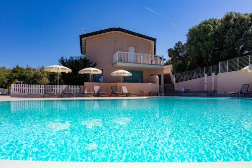 Bazén v ubytování Park Hotel Asinara nebo v jeho okolí