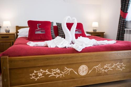 Postel nebo postele na pokoji v ubytování U Gawlaka - Noclegi z Jacuzzi i widokiem na Tatry
