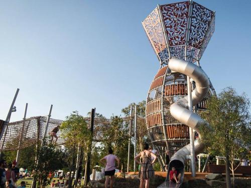 a playground with a slide in a park at Cozy Stay 4BR Townhouse in Pimpama