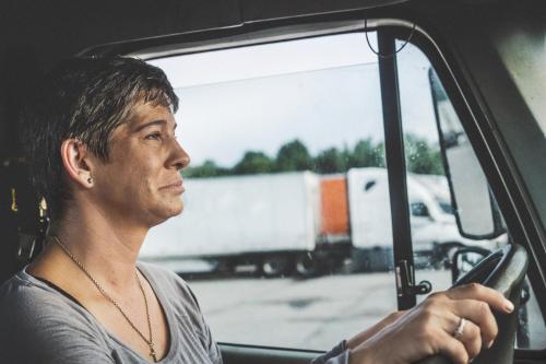 a man sitting in a truck looking out the window at Motel 6 - Franklin, OH in Franklin