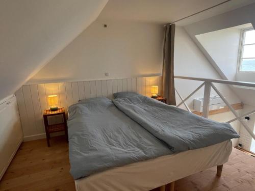 Postel nebo postele na pokoji v ubytování Wildernest Bornholm - Svanen