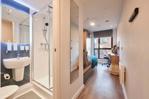 a bathroom with a shower and a sink at For Students Only York House Nottingham in Nottingham