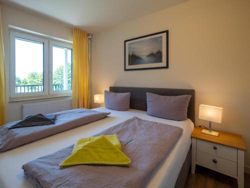 Postel nebo postele na pokoji v ubytování Appartementhaus Westerloog 08-Balkon