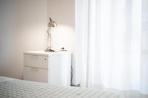 Кровать или кровати в номере Life Magenta Gijón