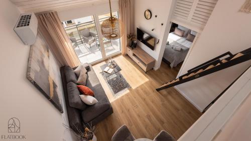 Posezení v ubytování Jantar Resort Flatbook - Wynajem Apartamentów nad Morzem