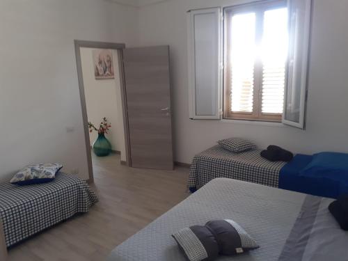 Letto o letti in una camera di Casa di SaleRosa