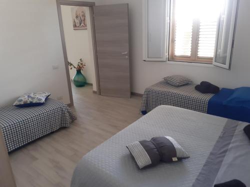 Letto o letti in una camera di Casa di SaleRosa
