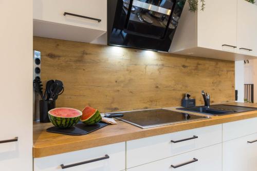 Dapur atau dapur kecil di Tropengeflüster Penthouse in Hof, Whirlpool, Balkon, Webergrill, Digital Checkin, Parkplatz, Wlan330Mbit
