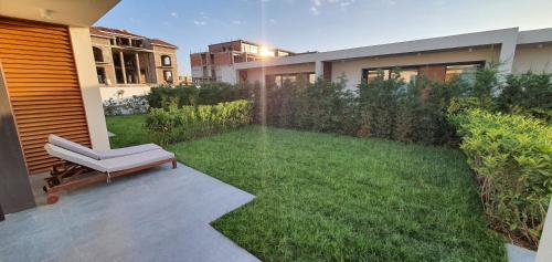 Κήπος έξω από το Escape 2 Seabreeze in Cozy Villa