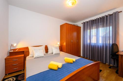 Ένα ή περισσότερα κρεβάτια σε δωμάτιο στο Apartman Neretvanka