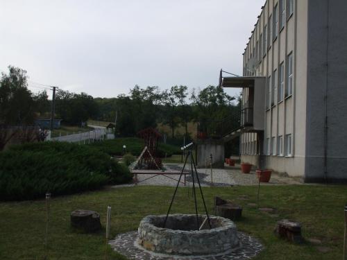 a playground in a yard next to a building at Chrám Ticha in ľubá