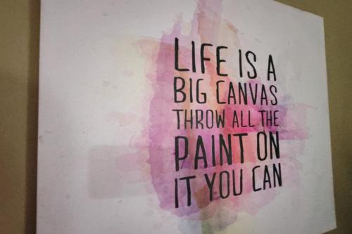 a picture of a painting with a quote at Hotel Check Inn 2 Cameron Highlands in Brinchang