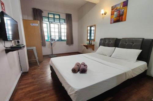 Postel nebo postele na pokoji v ubytování Hotel Check Inn 2
