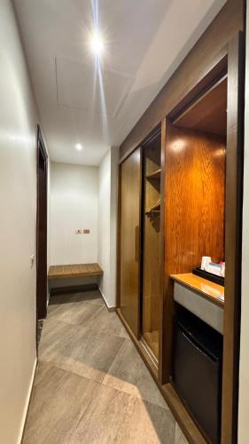 a bathroom with a walk in shower and a sink at Grand Ocean El Sokhna in Ain Sokhna
