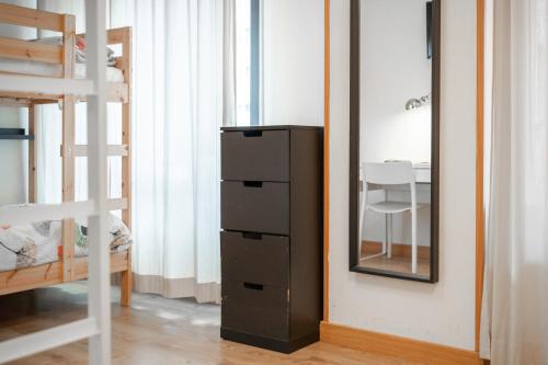 Кровать или кровати в номере Life Magenta Gijón