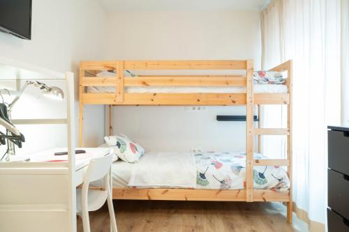 Кровать или кровати в номере Life Magenta Gijón