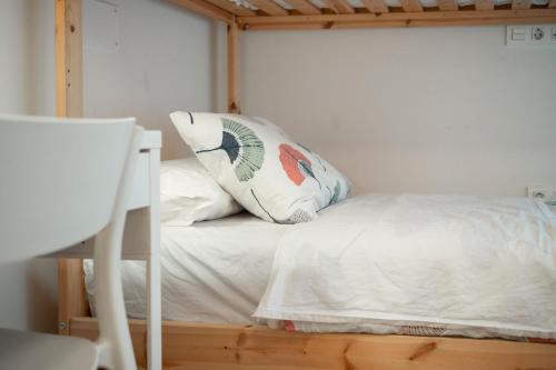 Кровать или кровати в номере Life Magenta Gijón