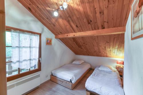 Postel nebo postele na pokoji v ubytování La Meije 9 Appt 4p