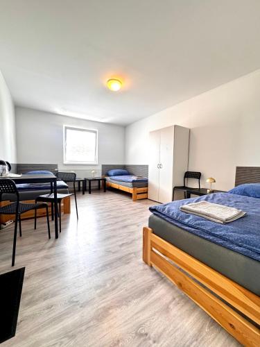Ein Bett oder Betten in einem Zimmer der Unterkunft Master