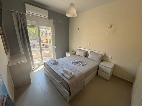 Postel nebo postele na pokoji v ubytování Ifi's apartment 2 bedrooms