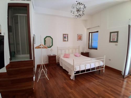 Ένα ή περισσότερα κρεβάτια σε δωμάτιο στο La Residenza 92