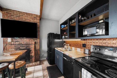 Η κουζίνα ή μικρή κουζίνα στο Breathtaking City View 1 Bed Stylish & Serene