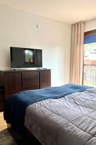 Katil atau katil-katil dalam bilik di Kraken - Apartament