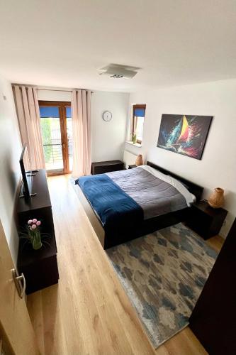 Katil atau katil-katil dalam bilik di Kraken - Apartament