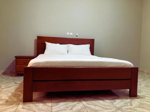 Postel nebo postele na pokoji v ubytování Résidence Romacy, Studio avec eau chaude à Ahala, quartier résidentiel de Yaoundé