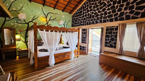 a bedroom with a bed in a room at Le Yercaud in Yercaud