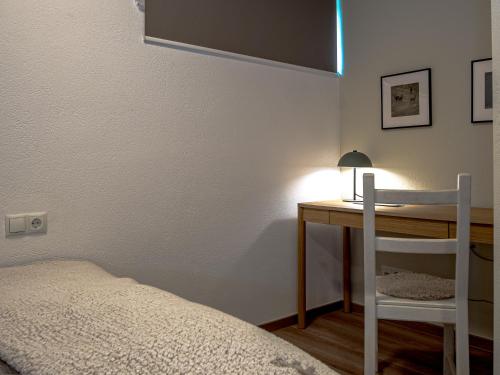 Postel nebo postele na pokoji v ubytování ,, Fuchs "