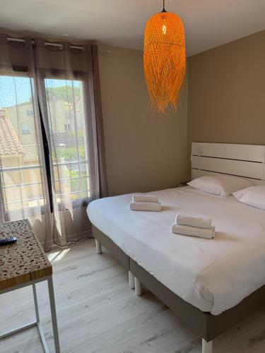 Postel nebo postele na pokoji v ubytování Hotel Aquarius
