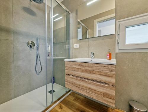 a bathroom with a shower and a sink at Al Castello in Vicenza