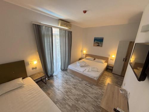 Postel nebo postele na pokoji v ubytování Hotel 415
