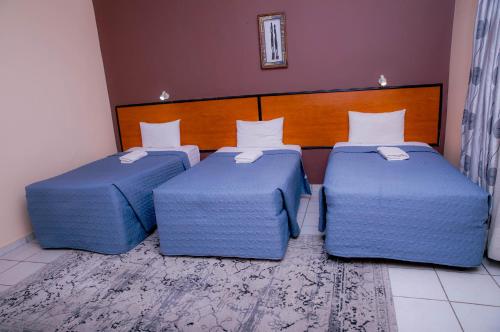 Postel nebo postele na pokoji v ubytování Mamli Guestlodge & Conferencing