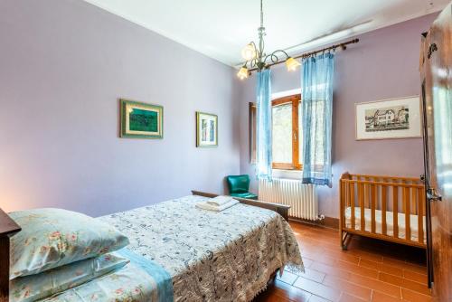 Ένα ή περισσότερα κρεβάτια σε δωμάτιο στο Agriturismo Paugnano