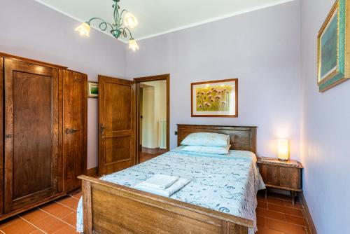 Ένα ή περισσότερα κρεβάτια σε δωμάτιο στο Agriturismo Paugnano