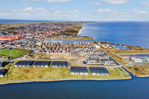 an aerial view of an island in the water at 9930-Hvide-Sande-Langsand-106-stuen in Hvide Sande