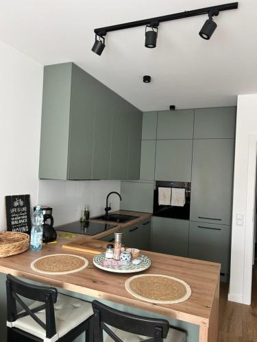 Kuchyň nebo kuchyňský kout v ubytování Apartament na Manhattanie