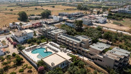 an aerial view of a building with a swimming pool at Time to Smile Saline in Tigaki