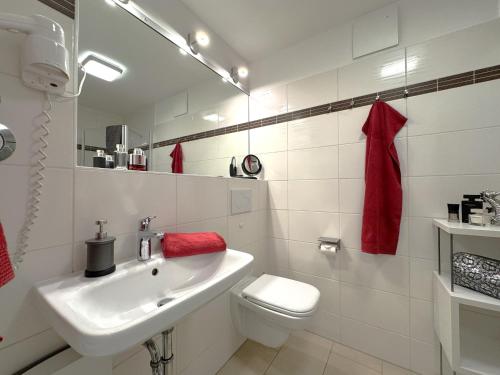 Ένα μπάνιο στο Käptn Brass Appartement 14 Meeresbrise