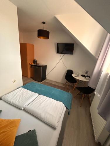 Postel nebo postele na pokoji v ubytování Pokoje I Apartamenty Polna 19